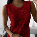 Intricate sleeveless lace blouse